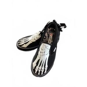 Airwalk Black Slip-On Shoes with Skeleton Footprint Design, Size 4